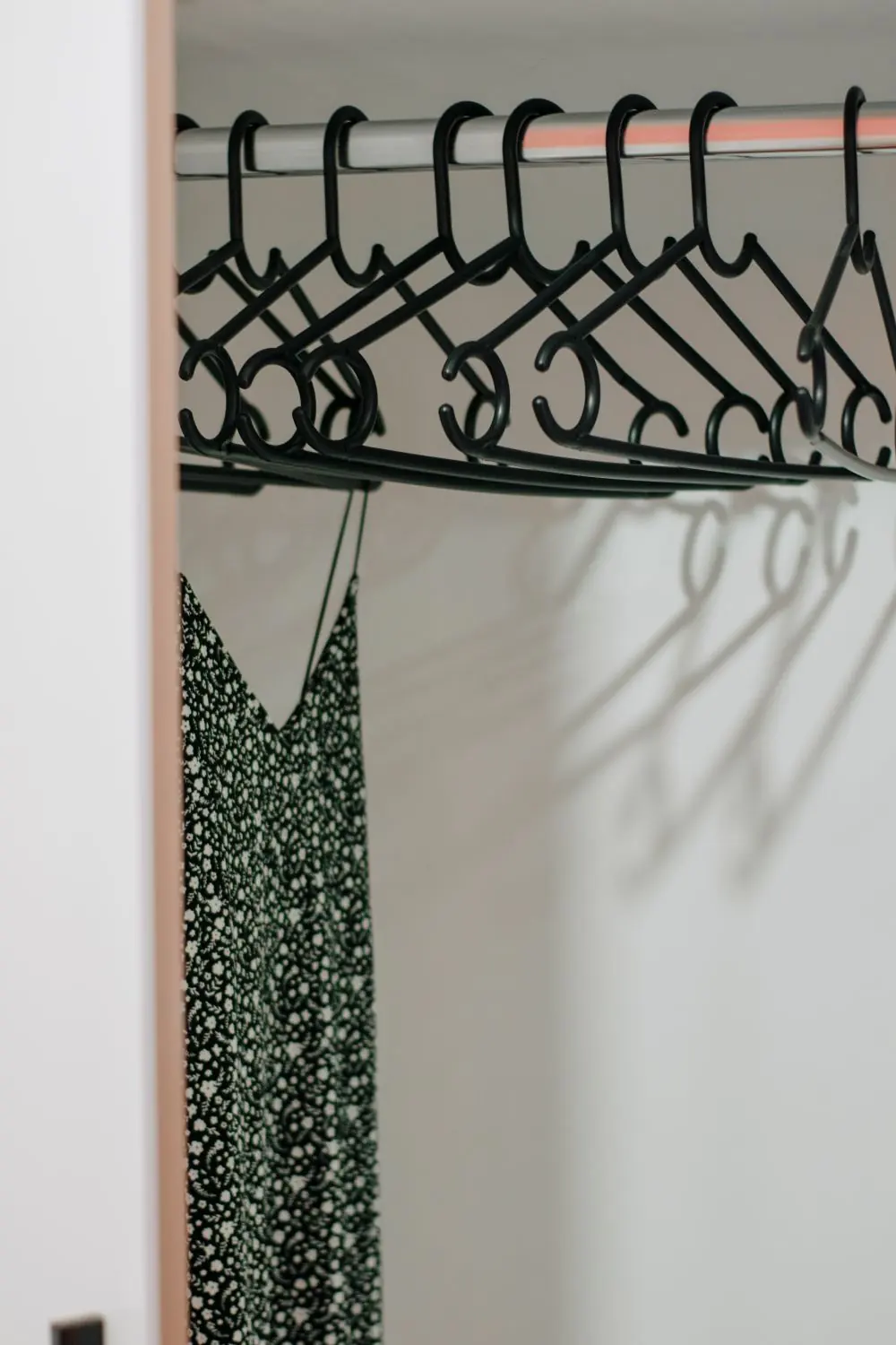 Reference photo 2: long dress hanging in a wardrobe — abayas & kaftans we manufacture and export in bulk to United Arab Emirates